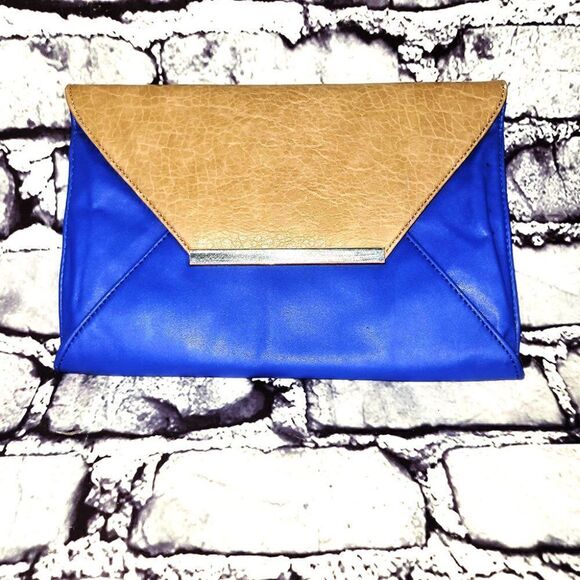 Poppie Jones Handbags - Poppie Jones blue and tan faux leather clutch